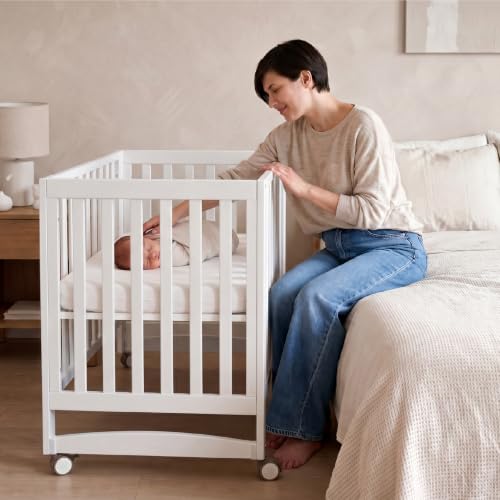 EvoNest 6-in-1 Convertible Baby Mini Crib with Wheels
