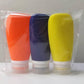Travel Bottles for Toiletries, TSA Approved 3oz Leak Proof Silicone Refillable Squeeze Travel Size Containers BPA Free for Cleansers, Lotions, Shampoo 3pk (Orange-Blue-Yellow).