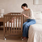 EvoNest 6-in-1 Convertible Baby Mini Crib with Wheels