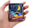 8‑Compartment Metal Pill Box Organizer – Portable Medicine Case 3″×2.6″ | Food‑Grade Dividers | Secure Snap Button Lid | Travel & Gift for Seniors (Dreamy Moon and Rainbow Skies)