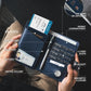 VULKIT Passport Holder with Airtag Holder RFID Blocking Passport Wallet Travel Leather Passport for Women(Black Navy)