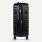 Amazon Basics 21" Hardside Carry-On Luggage, Hardshell Suitcase With Wheels, Expandable For Up to 25% More Space, With Scratch-Resistant Surface, Four Multi-directional Wheels, Black - Roamly
