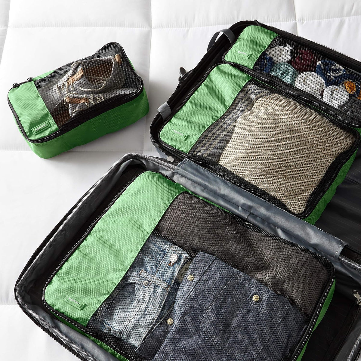 Amazon Basics Packing Cubes for Travel, Packing Organizers Set, 4-Piece-Set (Slim, Small, Medium, Large) With Double Zipper Pulls and Mesh Top Panel, 100% Durable Polyester, Green - Roamly